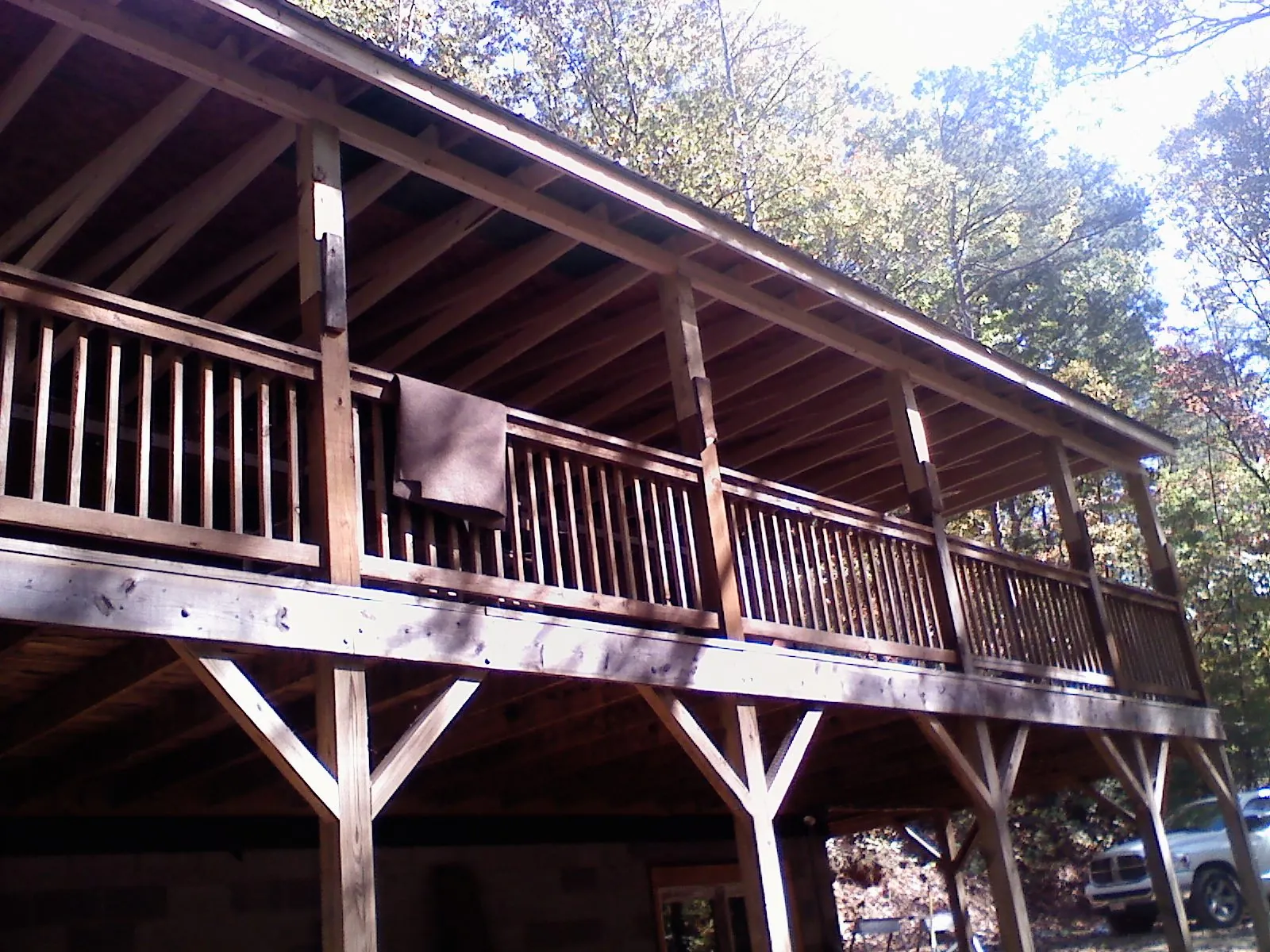 Timber framing under a new elevated porch and deck — Roof Leak Repair in Dundee by Roofing Brothers